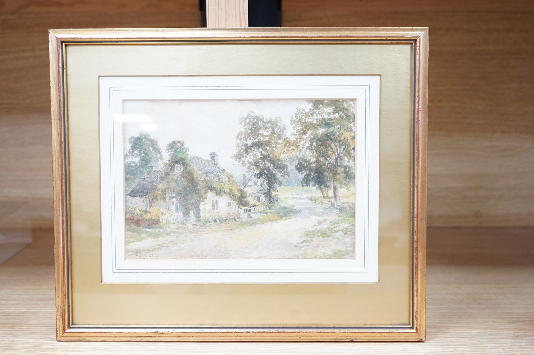Albert E. Gyngell (1874-1911), watercolour, Cottage in a wooded country landscape, signed, The Falcon Gallery inscribed label verso, 17 x 24cm. Condition - foxed